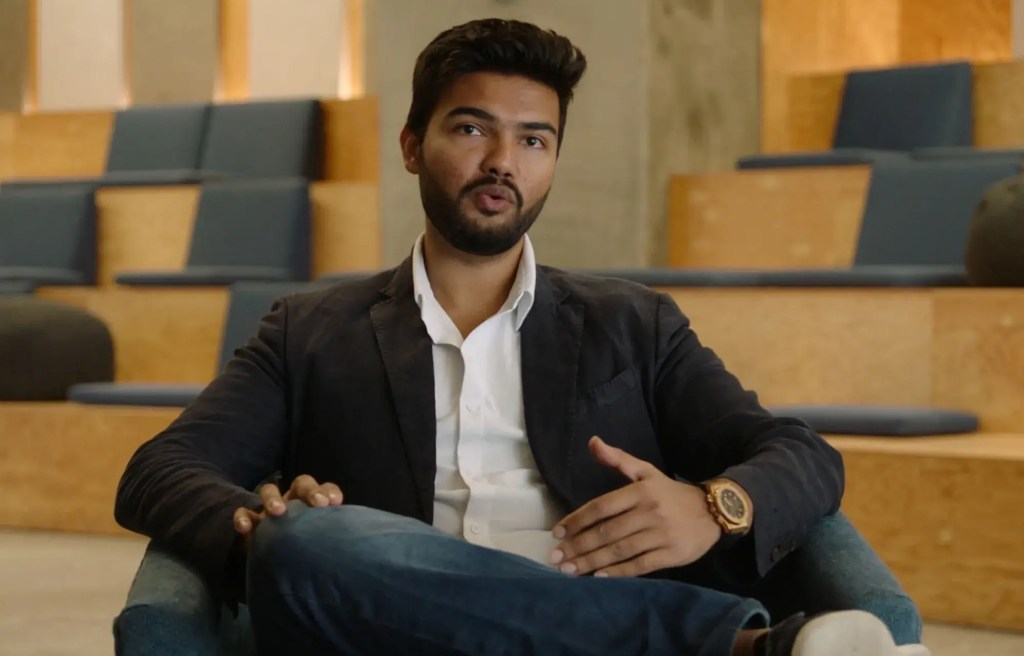 photo of Wispr CEO Tanay Kothari seated in chair